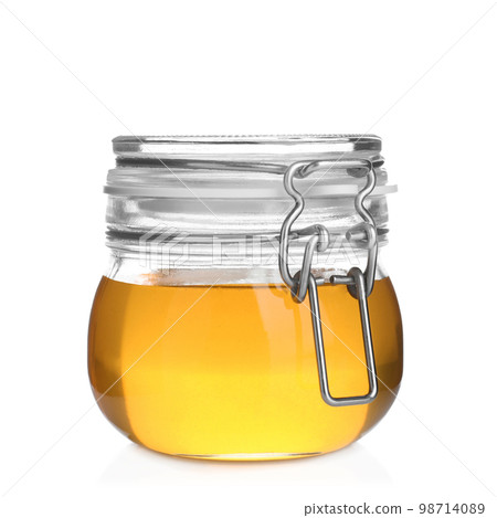 Jar of organic honey isolated on white Jar of organic honey isolated on white 98714089