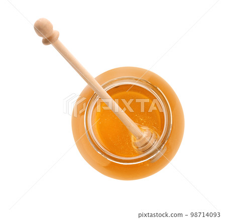 Jar of organic honey and dipper isolated on white, top view Jar of organic honey and dipper isolated on white, top view 98714093