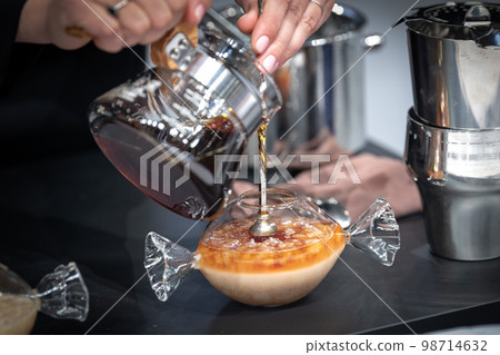 Famous handmade filter coffee in a cup Famous handmade filter coffee in a cup 98714632