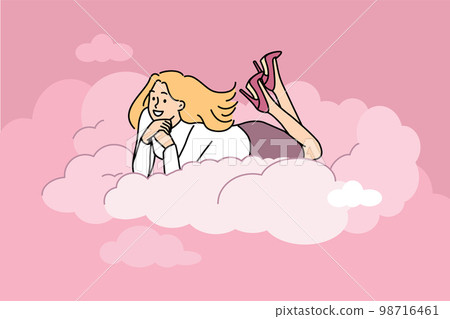 Smiling woman lying on cloud dreaming  98716461