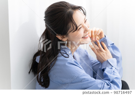 A woman with a smile A woman with a smile 98716497