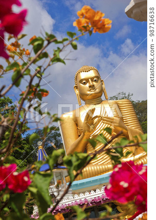 Golden Buddha Statue, Golden Temple of Dambulla, Sri Lanka Golden Buddha Statue, Golden Temple of Dambulla, Sri Lanka 98716638