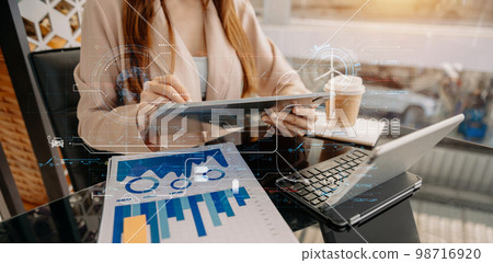 Business working with reduce CO2 concept with icons, global warming such as reforest green factory recycle and zero carbon dioxide emission concept. with VR icon at office. Business working with reduce CO2 concept with icons, global warming such as reforest green factory recycle and zero carbon dioxide emission concept. with VR icon at office. 98716920