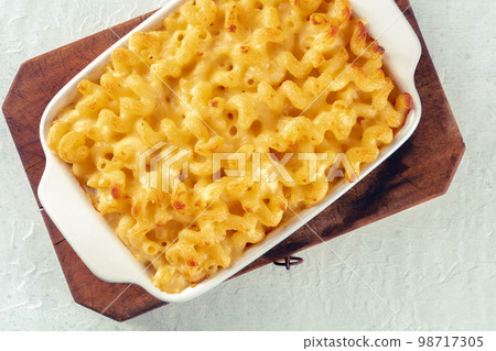 Macaroni and cheese pasta in a casserole, shot from the top. Cheesy food 98717305