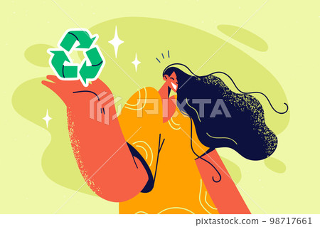Smiling woman with recycling symbol in hands  98717661