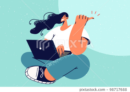 Smiling woman work on laptop show thumb up Smiling woman work on laptop show thumb up 98717688