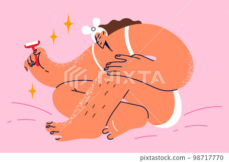 Woman shaving legs with razor 98717770