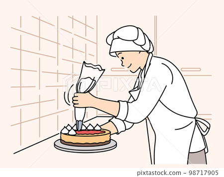 Female chef decorating cake at restaurant  98717905