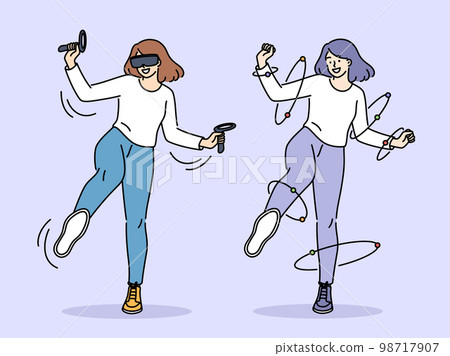 Smiling woman dancing in VR glasses  98717907