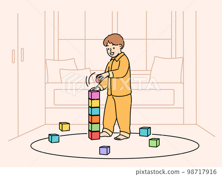 Cute child play with building blocks  98717916
