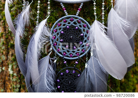 Handmade dream catcher with feathers threads and beads rope hanging Handmade dream catcher with feathers threads and beads rope hanging 98720086
