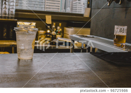Counter with carbonated water and beer Counter with carbonated water and beer 98725986