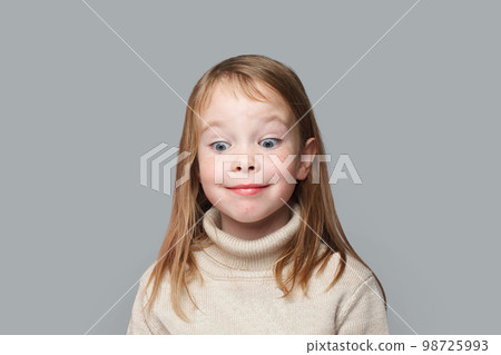 Mischievous kid girl portrait. Cute little girl Mischievous kid girl portrait. Cute little girl 98725993