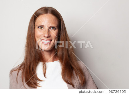 Attractive female face. Perfect optimistic successful mid adult woman portrait 98726505