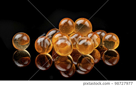 Red caviar isolated on black background, macro 98727977