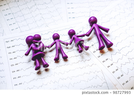 International Epilepsy Day, Epilepsy awareness. Purple toy adults and kids people, family on brain wave on electroencephalogram EEG for epilepsy International Epilepsy Day, Epilepsy awareness. Purple toy adults and kids people, family on brain wave on electroencephalogram EEG for epilepsy 98727993