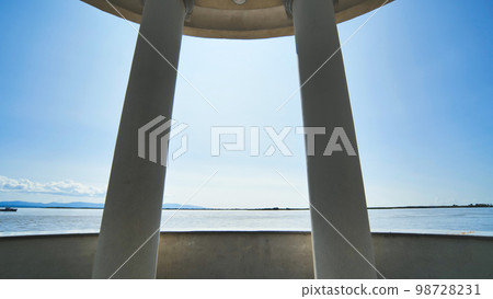 White rotundas in the city near the waterfront. White rotundas in the city near the waterfront. 98728231