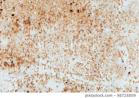 Rusty metal plate with cracks texture on peeling paint, close-up Rusty metal plate with cracks texture on peeling paint, close-up 98728809