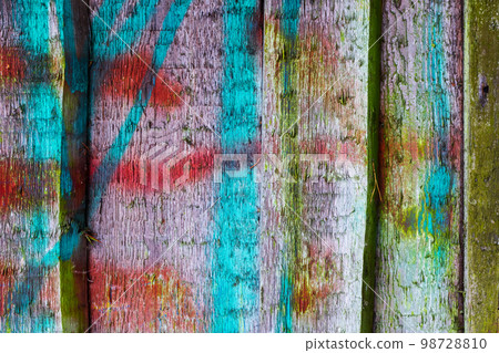 Grungy colorful old wooden wall, abstract background texture Grungy colorful old wooden wall, abstract background texture 98728810