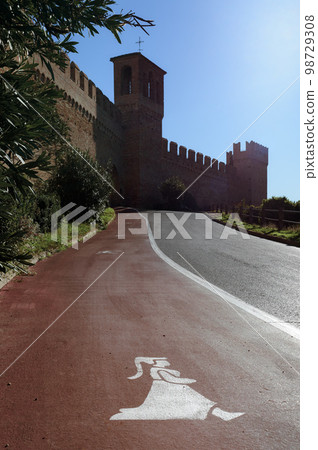 Funny medieval lady pedestrian sidewalk in Gradara (Italy) Funny medieval lady pedestrian sidewalk in Gradara (Italy) 98729308