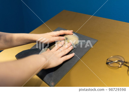 Woman's hands touches exposition in museum. Convex exhibit for visually impaired and blind people. Braille and accessibility for disabilities people Woman's hands touches exposition in museum. Convex exhibit for visually impaired and blind people. Braille and accessibility for disabilities people 98729398