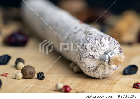 Chunks of sliced sausage with white mold Chunks of sliced sausage with white mold 98730295