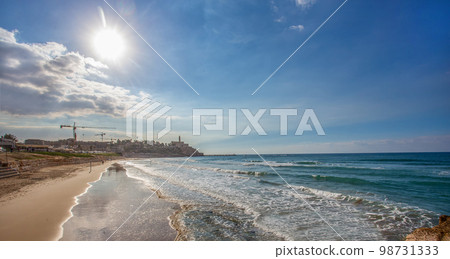 Sand beach in Tel Aviv - view on Old Jaffa 98731333
