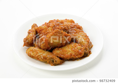 Chicken Wings Boiled in Ketchup Chicken Wings Boiled in Ketchup 98732409