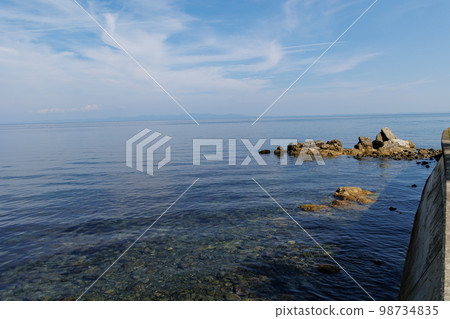 The coast of Natsudomari Peninsula in summer (Hiranai Town, Aomori Prefecture) 98734835