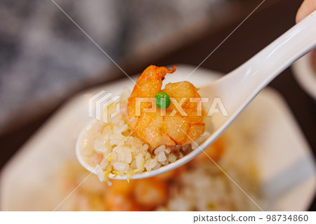 Shrimp fried rice with green peas from town Chinese (close-up) Shrimp fried rice with green peas from town Chinese (close-up) 98734860