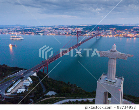 Illuminated Lisbon and 25th April Bridge Illuminated Lisbon and 25th April Bridge 98734958