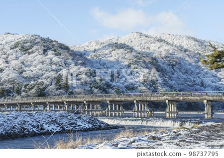 Togetsukyo Bridge in Arashiyama, Kyoto covered in snow Togetsukyo Bridge in Arashiyama, Kyoto covered in snow 98737795