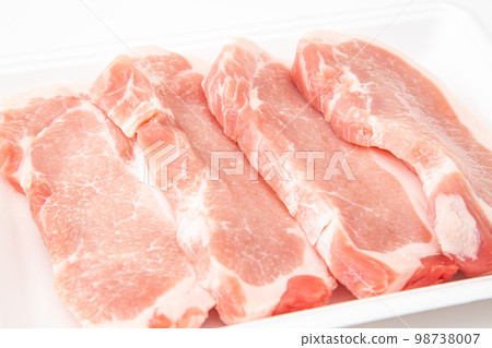 Pork loin in a tray white background 98738007