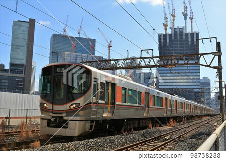 [JR West Japan] Series 323 running against the backdrop of the Umekita redevelopment area 98738288