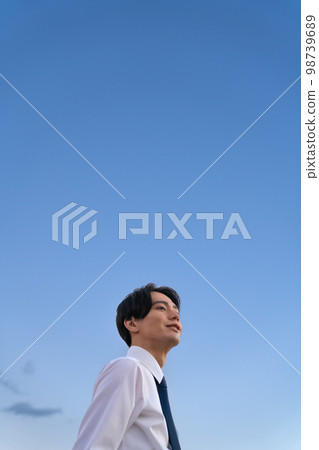 Blue sky and office worker Blue sky and office worker 98739689