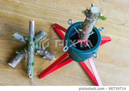 A Christmas tree trunk cut into pieces after celebrating the new year 98739714