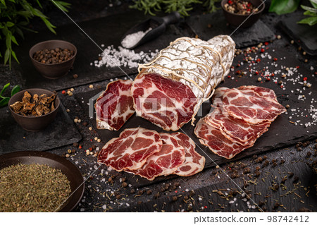 Slices of appetizing coppa Slices of appetizing coppa 98742412