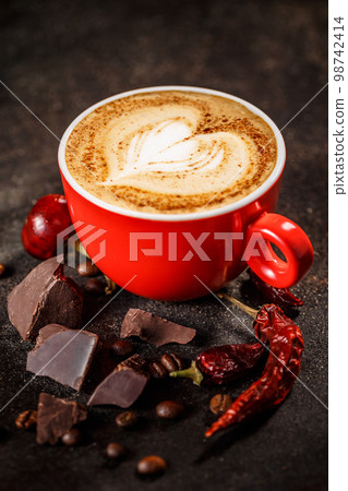 Chili and chocolate flavored coffee Chili and chocolate flavored coffee 98742414