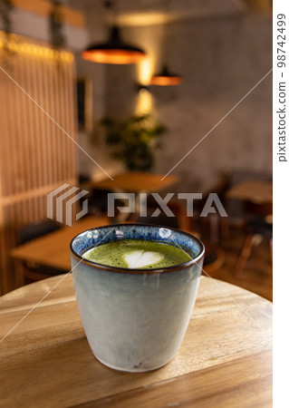 Cup of matcha latte 98742499