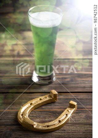 Green beer and horseshoe Green beer and horseshoe 98742512