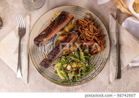 Delicious barbecued ribs Delicious barbecued ribs 98742607