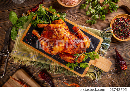 Oven baked whole chicken Oven baked whole chicken 98742795