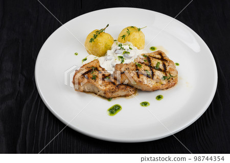 Grilled pork meat with 98744354