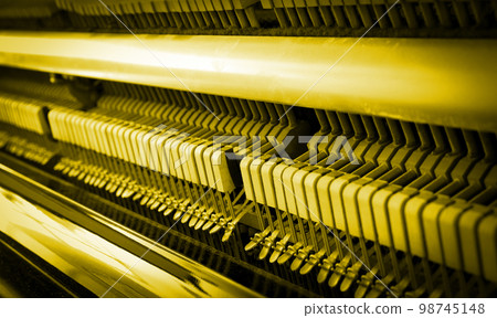 Details of piano mechanism gavel - string, pins and hammers Details of piano mechanism gavel - string, pins and hammers 98745148