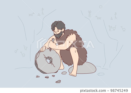 Ancient man with beard who lives in cave uses stone tool to create wheel. Vector image 98745249