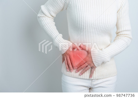 woman having side back pain. Urinary system and Stones, Cancer, world kidney day, Chronic kidney stomach, liver pain and pancreas concept woman having side back pain. Urinary system and Stones, Cancer, world kidney day, Chronic kidney stomach, liver pain and pancreas concept 98747736