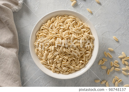 Pasta Cavatelli in white plate on gray. 98748137