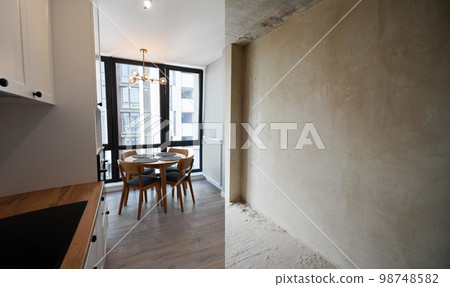 Comparison of old apartment and new flat with modern interior, parquet floor, table, chairs and white walls. Concept of home renovation. Empty room with large window before and after restoration. 98748582
