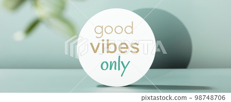 Quote Only good vibes on White Cylinder podium with eucalyptus leaves Banner 98748706