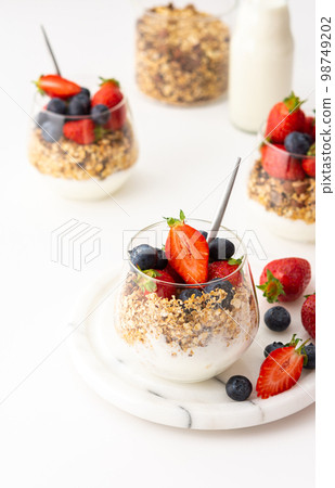 Homemade granola in a glass Homemade granola in a glass 98749202